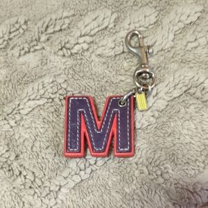 COACH purple, Hot Pink With Red Trim 'M' Keychain